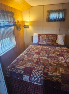 Mobile Home •Lakeside •1 full size bed •1 twin bed •Bathroom with shower stall •Efficiency kitchen with dinette table for 4 Sleeps up to 3 Seasonal only.